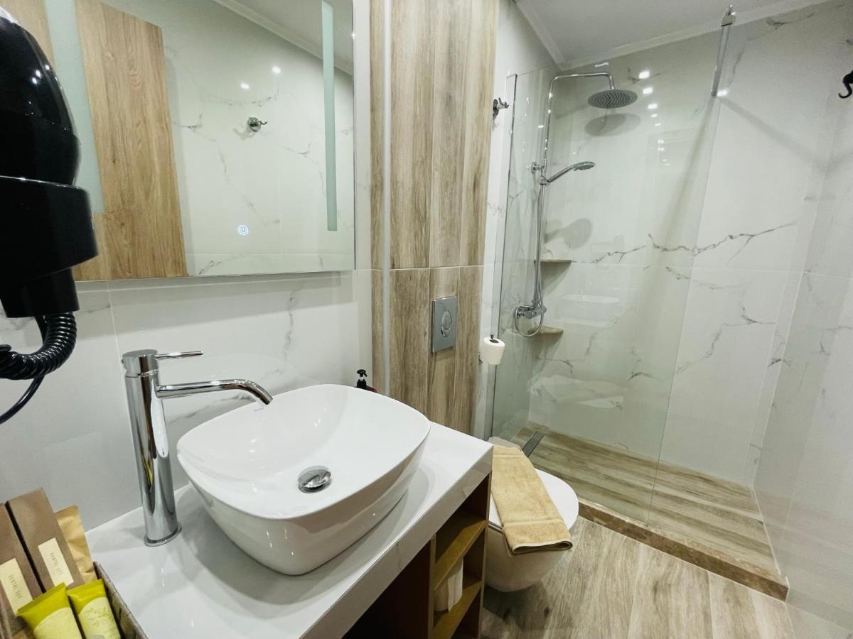 Xenios Suites Лигурион Экстерьер фото